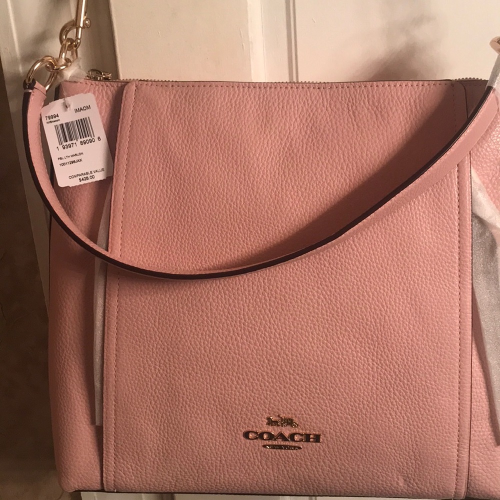 Coach pocketbook, and pink shoes I will be going out of business soon